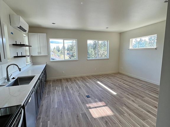 Main living area/kitchen looking from bathroom/bedroom entrance.