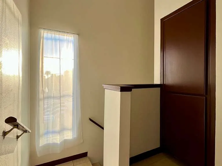 Top of stairwell, second floor landing