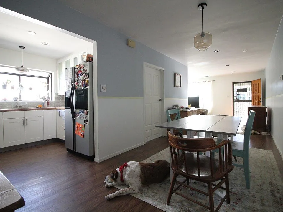 Apartment is unfurnished. Furniture shown for scale only.
