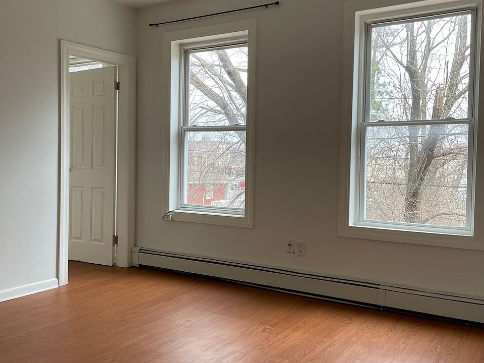 Primary bedroom with walk-in closet