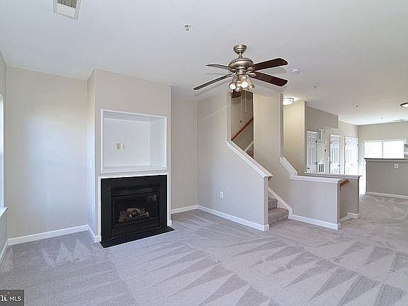 The Main level has Family room, Dining area and Kitchen. Freshly painted and new carpet throughout the house.