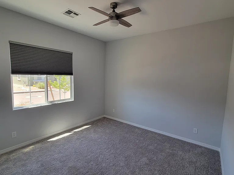 Rear Primary Bedroom 12' 9" x 15' 3"