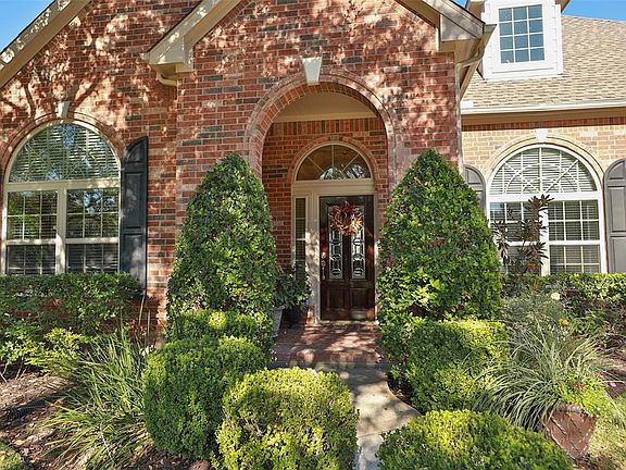Full American brick exterior, arched entryway and RING doorbell will convey.