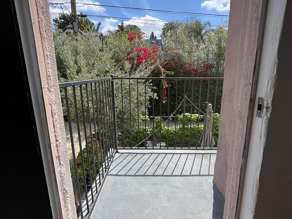 Private Wrap Around Balcony Overlooking Common Area Patio