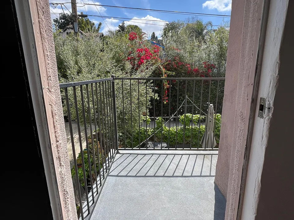 Private Wrap Around Balcony Overlooking Common Area Patio