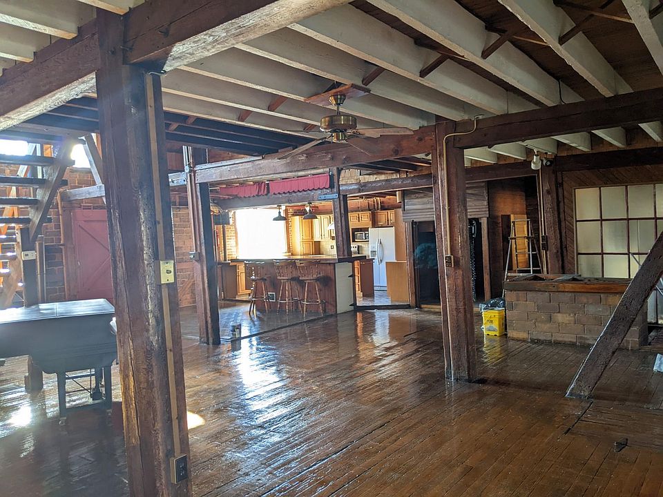 Entry level, large open space. Kitchen in background