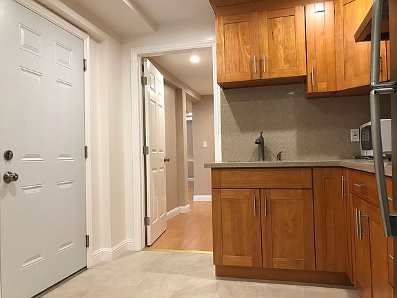 Kitchen looks toward hallway