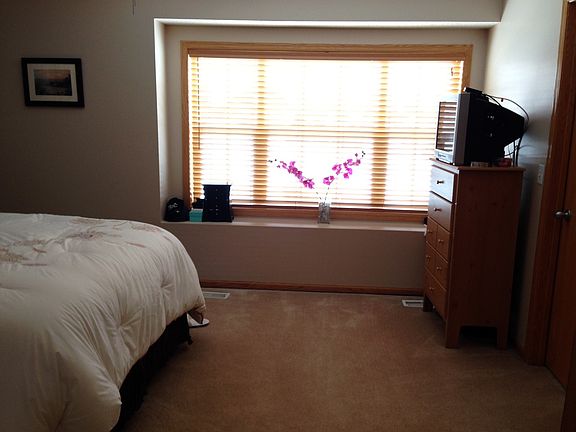 Large window in master bedroom