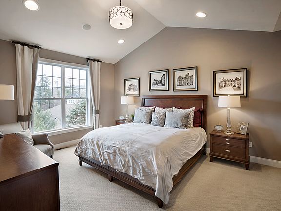 Main floor master bedroom with cathedral ceiling