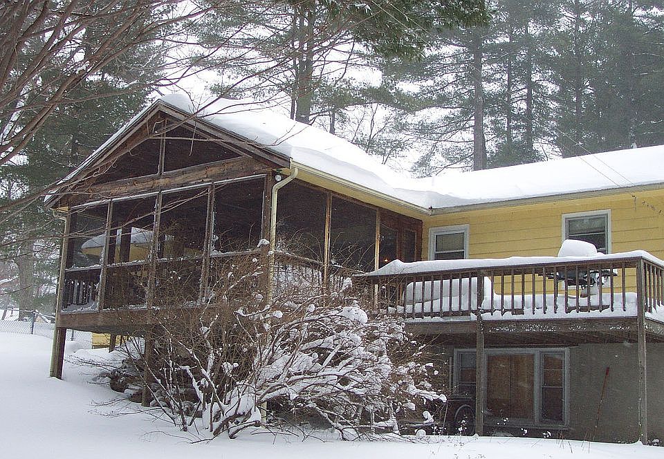 Screened in back porch and deck