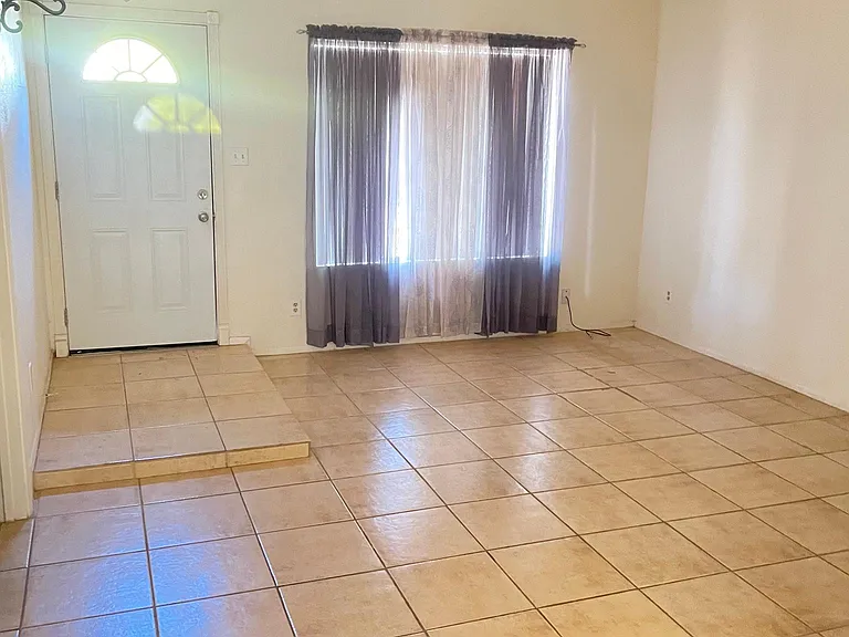 Living Room
Does not show new paint or ceilings redone.