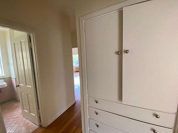 Linen closet off dining room/between bedrooms