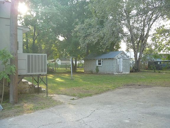 back yard, shows storage shed