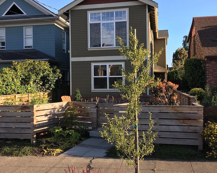 Front of home. The 1st floor windows are yours!