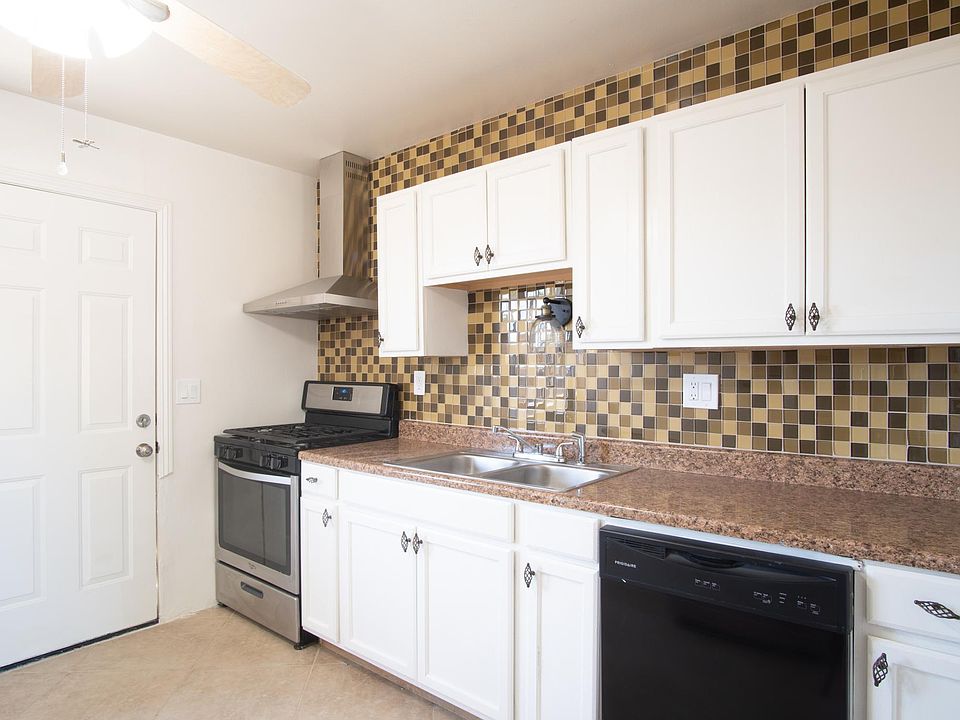 Enjoy direct access to the backyard from the kitchen for barbecuing!