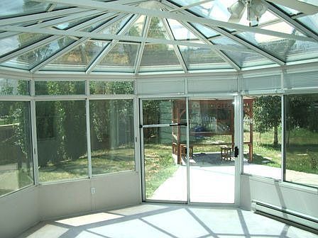 Attached solarium/sunroom, not counted in the homes square footage.