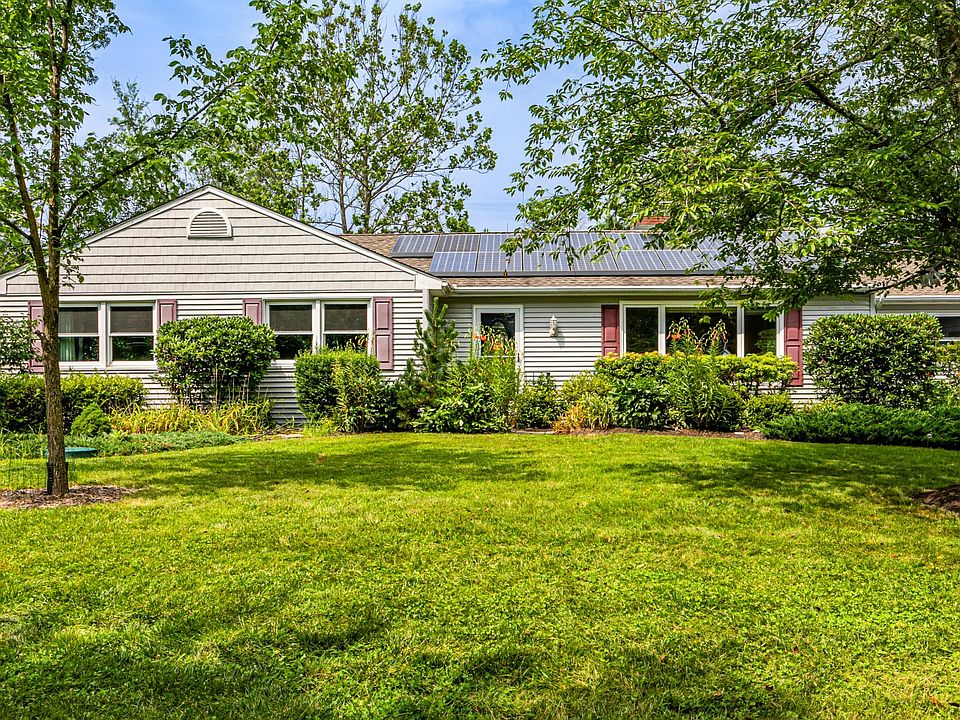Front view of home, ample off street private parking in driveway to right of house.