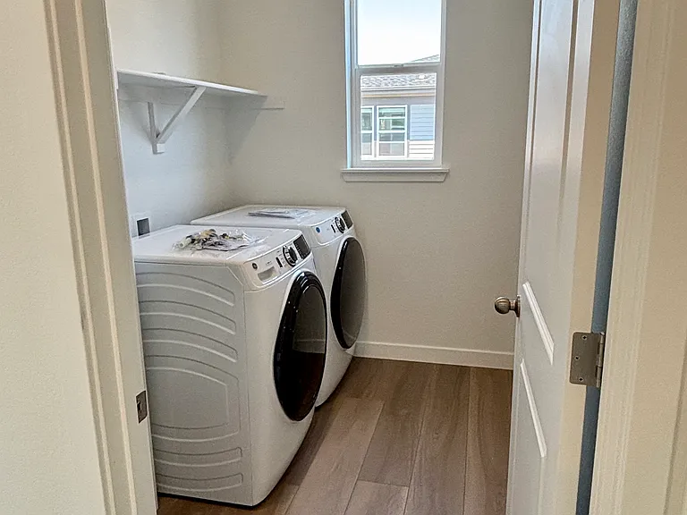 upstairs laundry room washer and dryer included