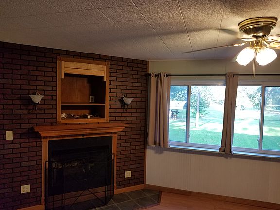 fireplace with TV above