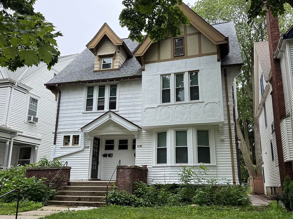 Front of house, lower unit in duplex