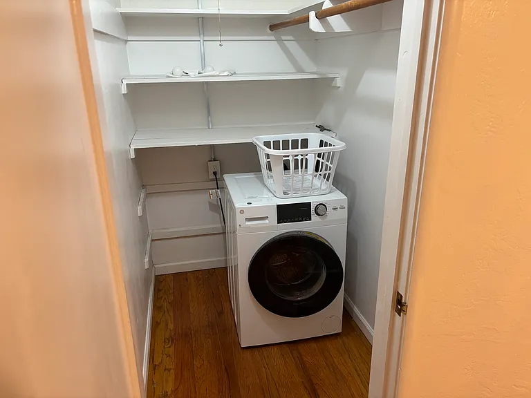 Washer/Dryer in closet. It is a combination unit, it washes and dry's.