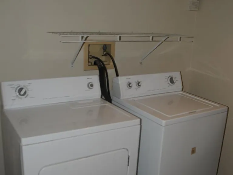 Laundry hookups in Lower level hallway