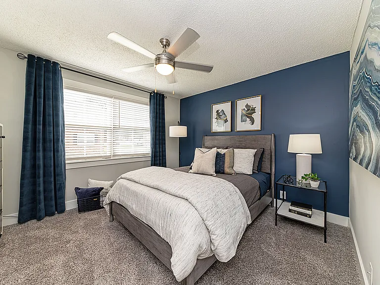 Bedroom with carpet & ceiling fan