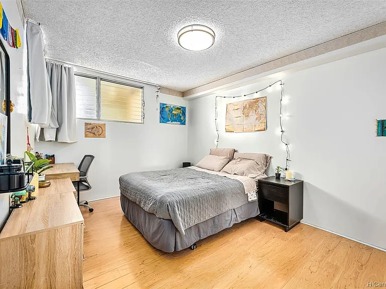 large mountain side bedroom with double sliding door closet and separate AC control.