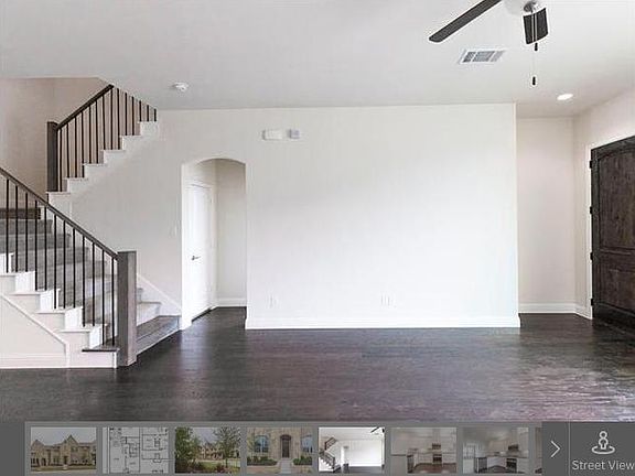 Entrance and staircase to 2nd level