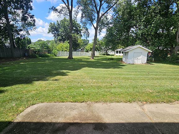 Back yard with tool shed