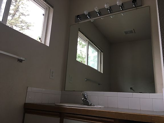 each bedroom has it's own bathroom across the hall from one