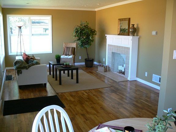 Refinished vintage hardwood floors and fireplace
