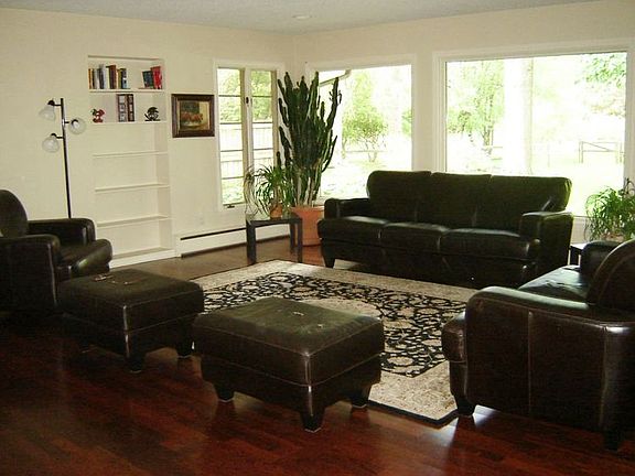 br /The Living Room is large and open ...........the rear wall being allbr /windows over-looking the great back-yard.br /This room is large enough to be able to arrange your furniture inbr /many different ways.