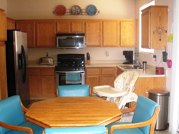 Kitchen, Clean steel Kenmore appliances stay with home.