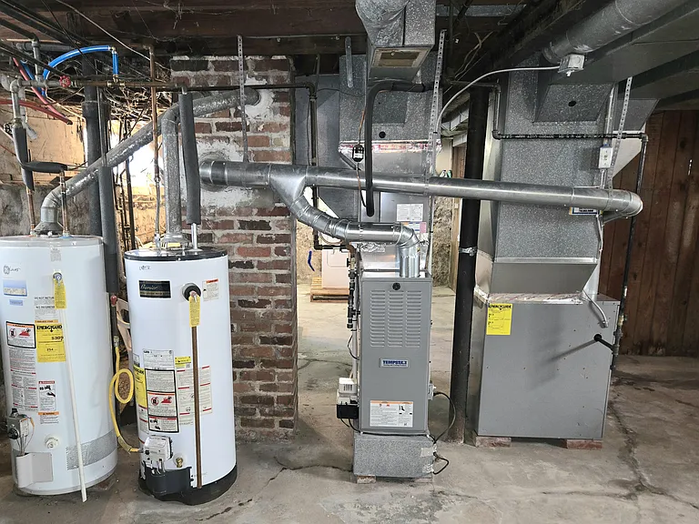 Newer furnace to right for lower rental unit
