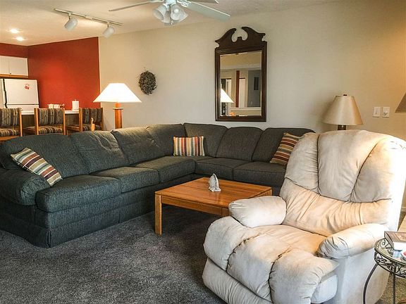 living room with wood fireplace