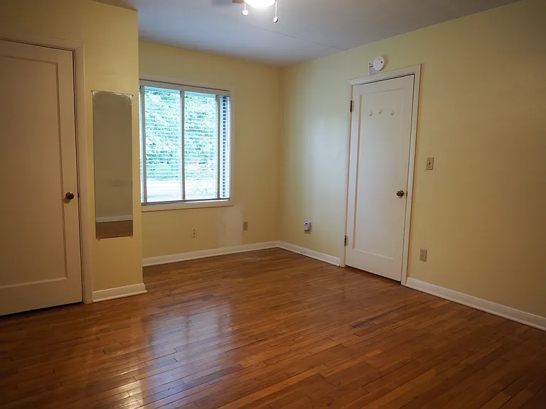 Master bedroom, cedar-lined closet to the left, hallway to the right.