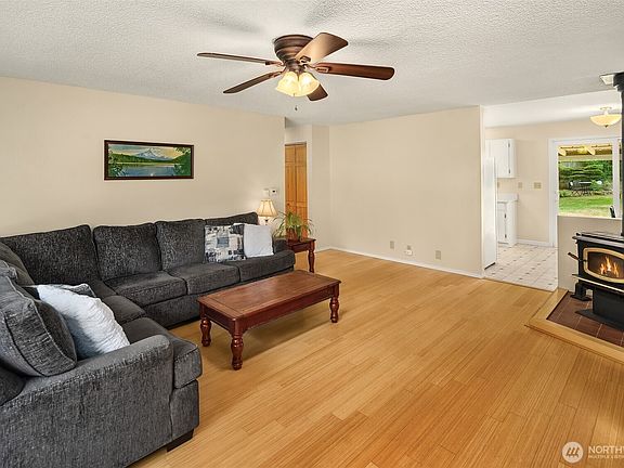 Enter into the living room from the main entrance and quickly start winding down from your busy day.>