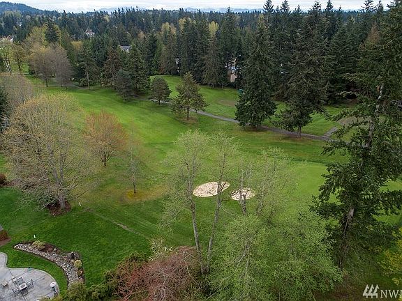 The kitchen features a garden window, plenty of cabinets, built-in double ovens and Sub-Zero refrigerator. Extend your gatherings outside onto your patio with a large yard and raised beds. Upstairs you'll love two rec-room sized rooms, large bath and storage galore. Enjoy instant equity with your updates! Fairwood amenities include 24/7 security patrol, parks, quiet streets and easy access to freeways, airport, hospitals, major retail, dining and community events.