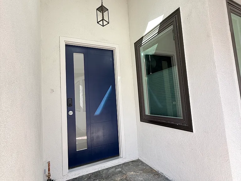 Front door with smart lock keypad.