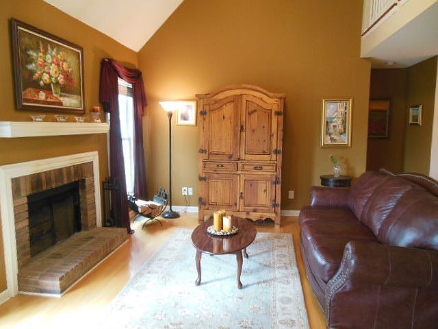 ANOTHER VIEW OF THE GREATROOM SHOWING VAULTED CEILING 