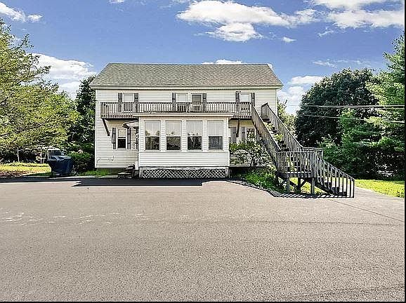 Front view overlooks the Saco river and mills