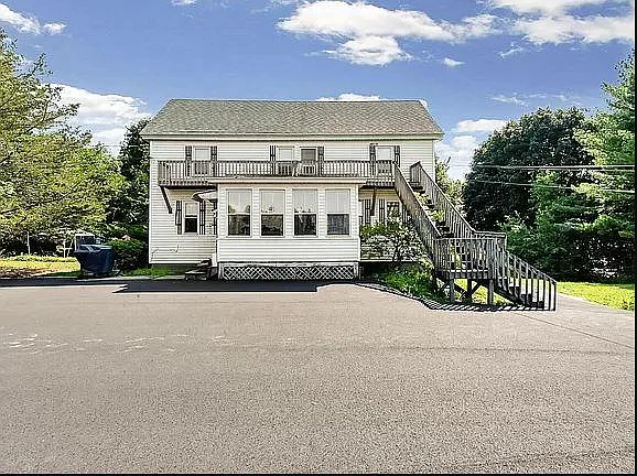 Front view overlooks the Saco river and mills