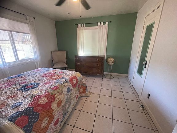 Bedroom with double bed and jack-and-jill bathroom.