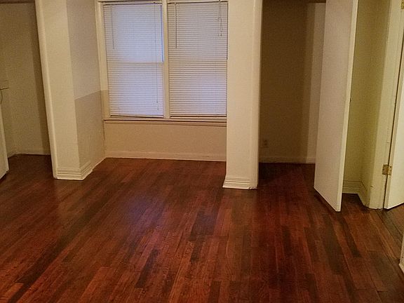 Bedroom view 20x20 wood floor refinished