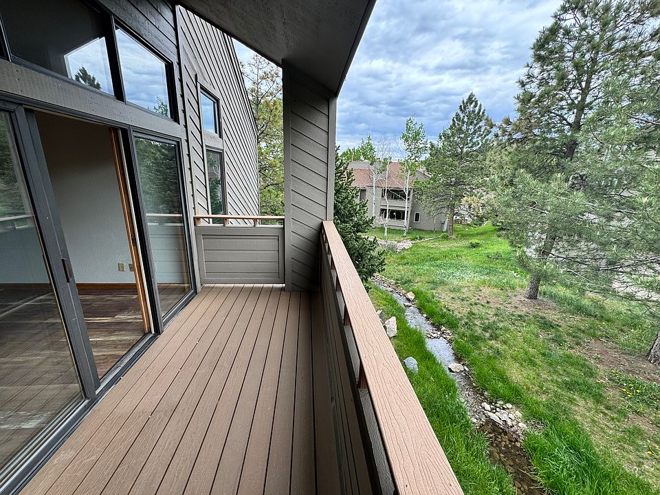 Private deck overlooking trees and natural open space _ ideal for morning coffee, fresh air, and quiet evenings in Genesee.