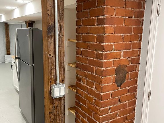 Funky old wooden beams and exposed brick chimney
