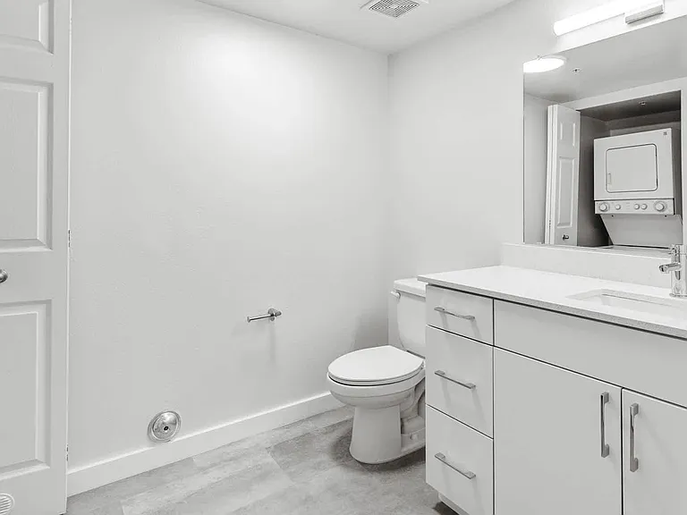 Bathroom with In-home Washer and Dryer