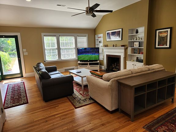 Living room with vaulted ceilings