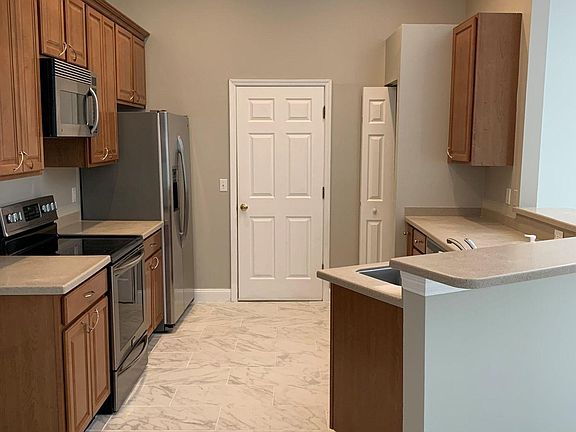Kitchen w/pantry door to the right